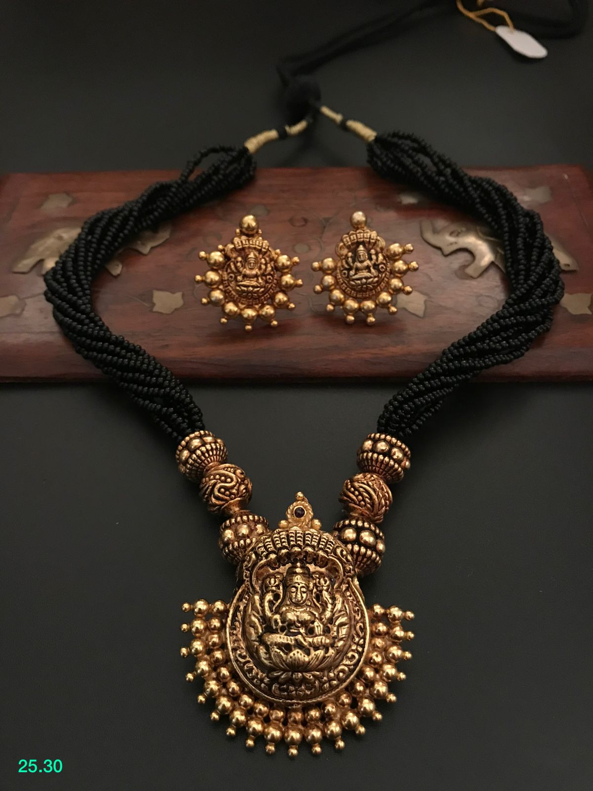 Kanakdharaa - Black Beads with Pure Silver Pendant with Gold Polish